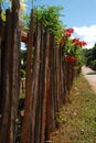 A wooden fence pole lined the street