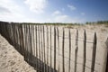 Wooden fence protecting the dunes Royalty Free Stock Photo