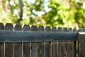 Wooden Fence with Green Bokeh Royalty Free Stock Photo