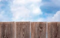 Wooden fence sky clouds. Natural background. Free space Royalty Free Stock Photo