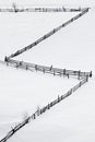 Wooden fence on the snow carpet Royalty Free Stock Photo
