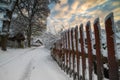 Wooden fence with snow, countryside