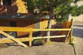 Wooden fences at sidewalk next to the house under construction to prevent passers-by from falling, from falling objects