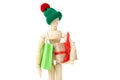 Wooden figure with gift box Royalty Free Stock Photo