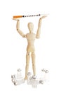 Wooden figure holding medicine injector