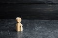 Wooden figure of mother and child. Concept of pregnancy, childbirth and upbringing. Fortunity. Education and guardianship of child Royalty Free Stock Photo