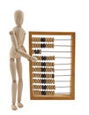 Wooden figure and old wooden abacus Royalty Free Stock Photo