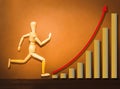 The wooden figure running on stairs of business plan