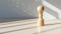 Graceful Balance: A Minimalist Wood Pedestal With Monochromatic Shadows