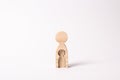 A wooden figure of a woman with a void inside in the shape of a child. The concept of the loss of child, abortion of pregnancy Royalty Free Stock Photo