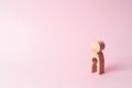 A wooden figure of a woman with a void inside in the shape of a child. The concept of the loss of child, abortion of pregnancy Royalty Free Stock Photo