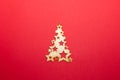 Wooden figures of Christmas or New Year, Christmas tree decorations, on a beautiful plain background, close-up. Royalty Free Stock Photo