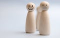 Wooden figures display happy contentment