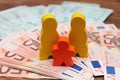 Family figures with money euro hundred Royalty Free Stock Photo