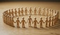 Wooden Figures Holding Hands in a Circle of Unity and Teamwork Royalty Free Stock Photo