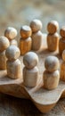 Wooden figures in a meeting or discussion, concept photo