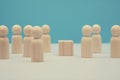 Wooden figures mockup, place for text. Blank people miniatures for creative design. Teamwork, leadership, copy space