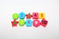 Wooden figures with numbers 1, 2, 3, 4, 5, 6, 7, 8, 9 and 10. Wooden cubes with numbers for children Royalty Free Stock Photo