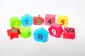 Wooden figures with numbers 1, 2, 3, 4, 5, 6, 7, 8, 9 and 10. Wooden cubes with numbers for children Royalty Free Stock Photo