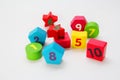 Wooden figures with numbers 1, 2, 3, 4, 5, 6, 7, 8, 9 and 10. Wooden cubes with numbers for children Royalty Free Stock Photo