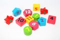 Wooden figures with numbers 1, 2, 3, 4, 5, 6, 7, 8, 9 and 10. Wooden cubes with numbers for children Royalty Free Stock Photo