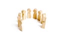 Wooden figures of people stand on a white background. Communication. Business team, teamwork, team spirit. Wooden figures Royalty Free Stock Photo