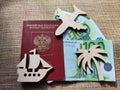 Wooden figurines, Russian passport, Euro banknotes. Concept of traveling and payment. Conflict of Russia and Ukraine