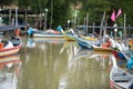 Wooden fish boat parking at the pier