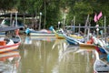 Wooden fish boat parking at the pier