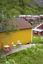 Wooden fishermans huts used as tourist accomodations in Nusfjord, Lofoten islands, Norway Royalty Free Stock Photo