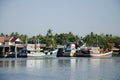 Wooden fishery boat floating and stop at Mae klong river