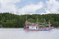 Wooden fishing boat docked in the harbor Royalty Free Stock Photo