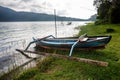 Wooden fishing boat on the lake