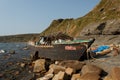 Wooden fishing boat from North Korea, shipwrecked after a storm off the coast of the Vladivostok