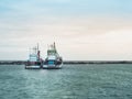 Wooden fishing boat in rock port. Royalty Free Stock Photo