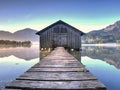 Wooden fishing boat shelter built above level of lake Royalty Free Stock Photo