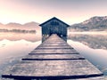 Wooden fishing boat shelter built above level of lake Royalty Free Stock Photo