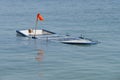 Wooden fishing boat submerged in water