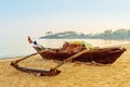 Wooden fishing boats at dawn on the beach. Royalty Free Stock Photo