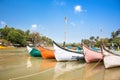 Wooden fishing boats on delta of Baga river Royalty Free Stock Photo