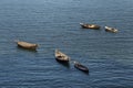 Wooden fishing boats in the drift.