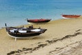 Wooden fishing boats dry on the seashore Royalty Free Stock Photo
