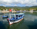 Wooden fishing boats on lake in Phuyen, Vietnam. Royalty Free Stock Photo