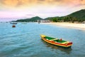 Colorful wooden fishing boat at the beach in Porto Belo.