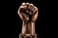 Wooden fist raised up. Symbol of freedom, fight, revolution, unity, strength and struggle. Generative AI