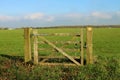 Wooden five bar gate in a field but no fence