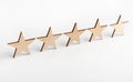 Wooden five star shape on white background