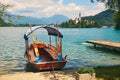 Pletna boat at the shore of the lake Bled, Slovenia Royalty Free Stock Photo
