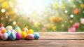 wooden floor with easter eggs and blurred spring meadow background easter holiday theme banner, for Royalty Free Stock Photo