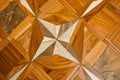 wooden floor with natural stone inlay in a geometric design